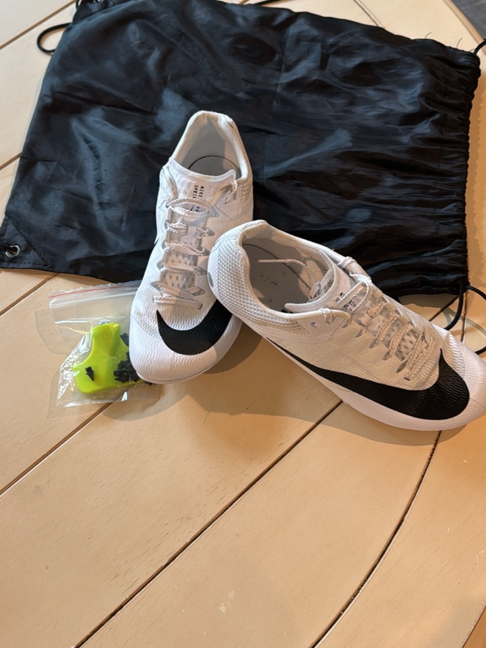 Nike White and Black Women's Cleats/Spikes